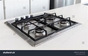 stock-photo-modern-hob-gas-stove-countertop-in-big-kitchen-interior-2383534193.jpg