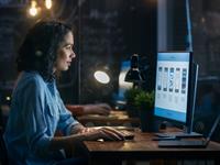 Shutterstock_1013448580_woman working with computer_sieviete strādā ar datoru.jpg