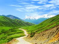 Shutterstock_2463990447_road in mountains_ceļš kalnos.jpg