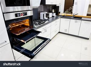 stock-photo-modern-luxury-hi-tek-black-and-white-kitchen-clean-interior-design-focu-at-oven-with-open-door-301234931.jpg