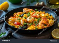 stock-photo-delicious-seafood-paella-with-shrimp-and-mussels-2503271525.jpg
