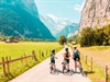 Shutterstock_2279477361_riding on bike_brauc ar velosipēdu.jpg