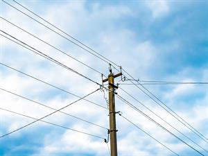 shutterstock_2316595025_electric pole with line wire_elektrības stabs ar vadiem.jpg