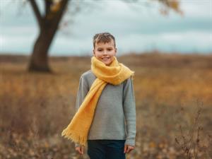 Shutterstock_2063931176_boy with scarf_zēns ar šalli.jpg