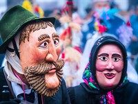 shutterstock_2560445455_wooden masks at carneval_koka maskas karnevālā.jpg