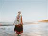 Rihards Lonskis Shutterstock_girl in national costume_meitene tautu tērpā.jpg