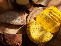 Shutterstock_1935635140_latvian traditional cheese and bread_latvju siers un maize.jpg