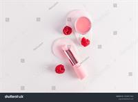 stock-photo-cosmetic-balm-in-a-tube-and-round-jar-with-a-delicate-structure-on-a-pink-background-for-lip-care-2528917463.jpg