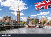 stock-photo-big-ben-with-bridge-over-thames-and-flag-of-england-against-blue-sky-in-london-england-uk-2209687145.jpg
