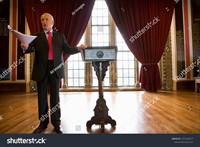 stock-photo-businessman-giving-speech-by-lectern-in-historic-hall-1277229277.jpg