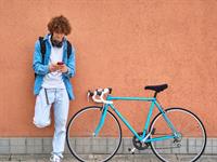 Shutterstock_2143498101_teenager with bicycle_pusaudzis ar velosipēdu.jpg